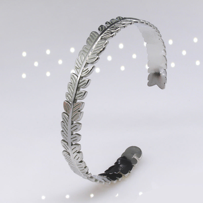 Hoja del árbol al por mayor C de forma de acero inoxidable ajustable brazalete de titanio